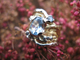 or jaune 750, or gris 750	aïgue-marine, diamant “brillant”